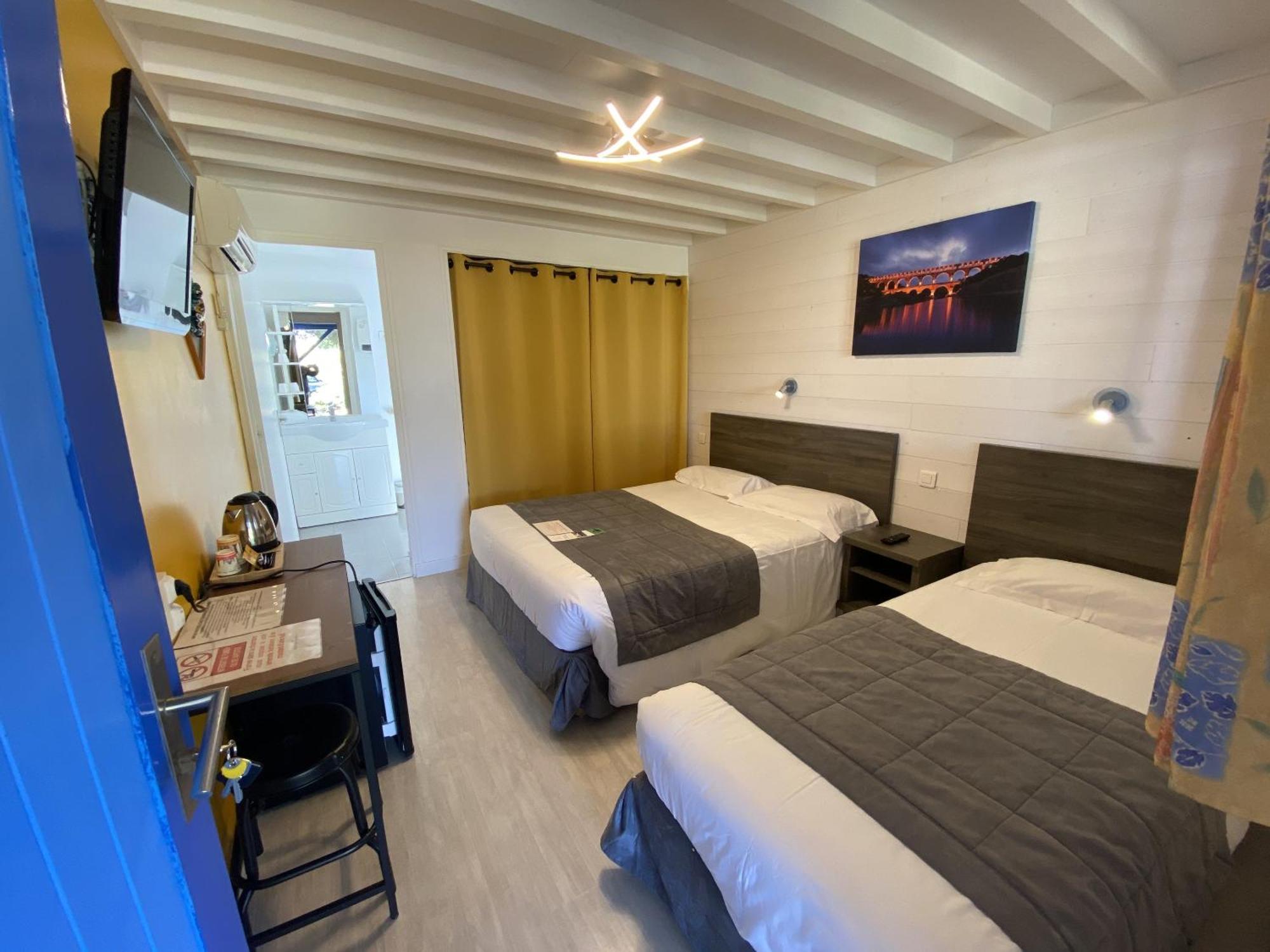 Hotel Des 4 Vents "Esprit Camargue" Aigues-Mortes Quarto foto